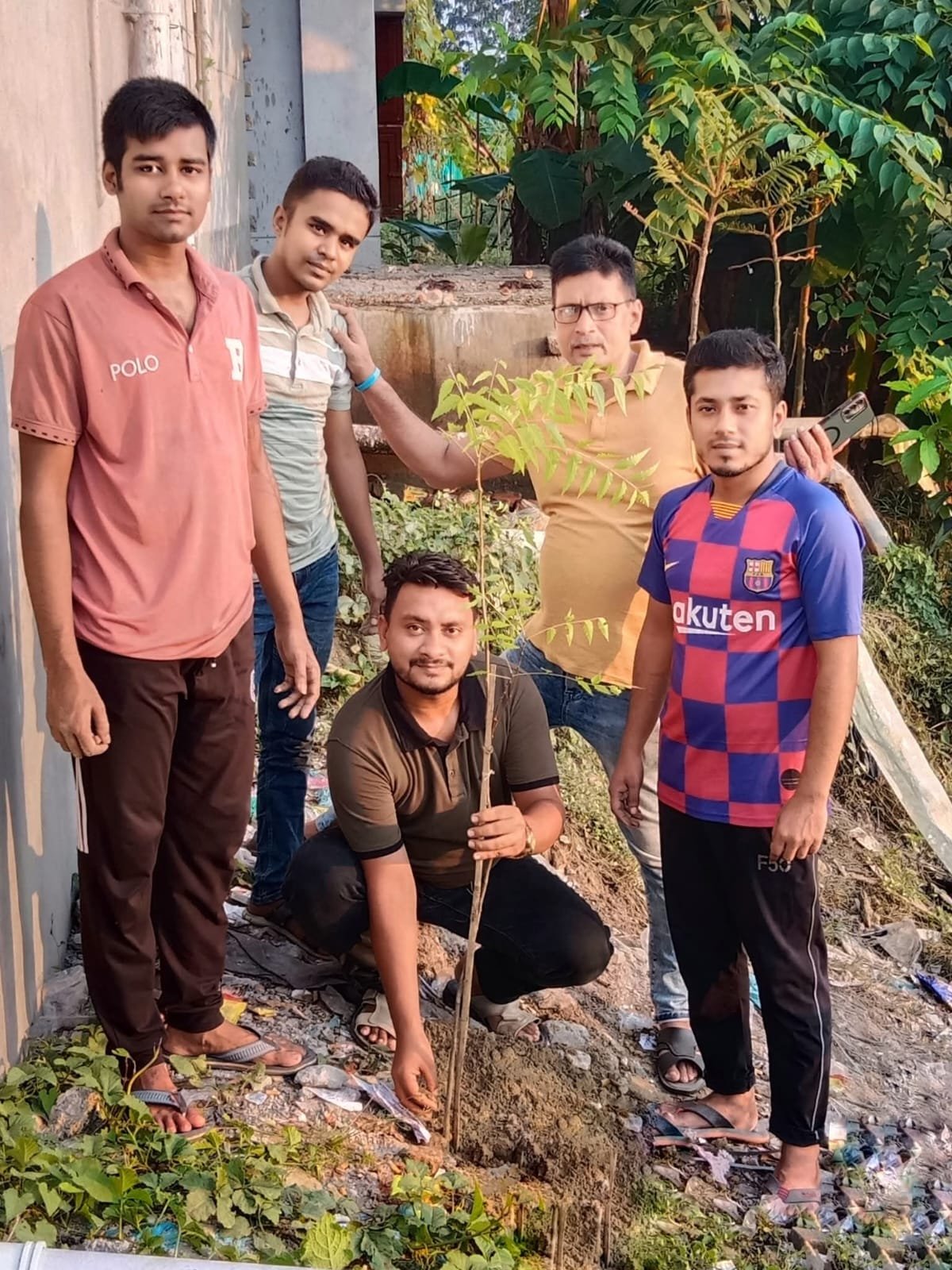 Tree planting activity by Change The Life team